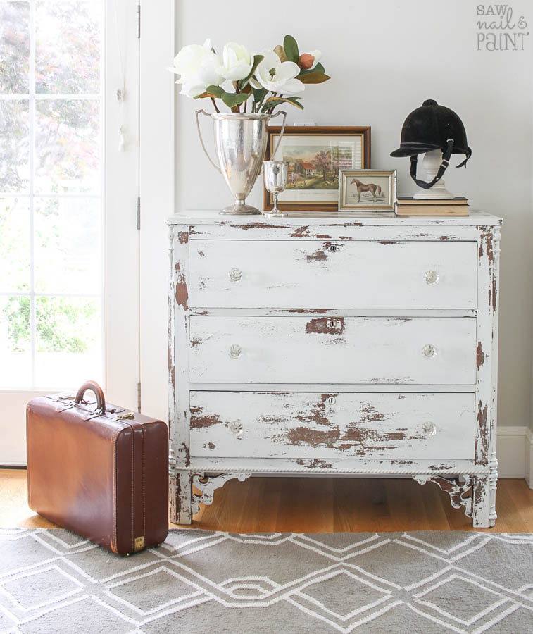 White Chippy Farmhouse Dresser With Glass Knobs And Trophy Cups