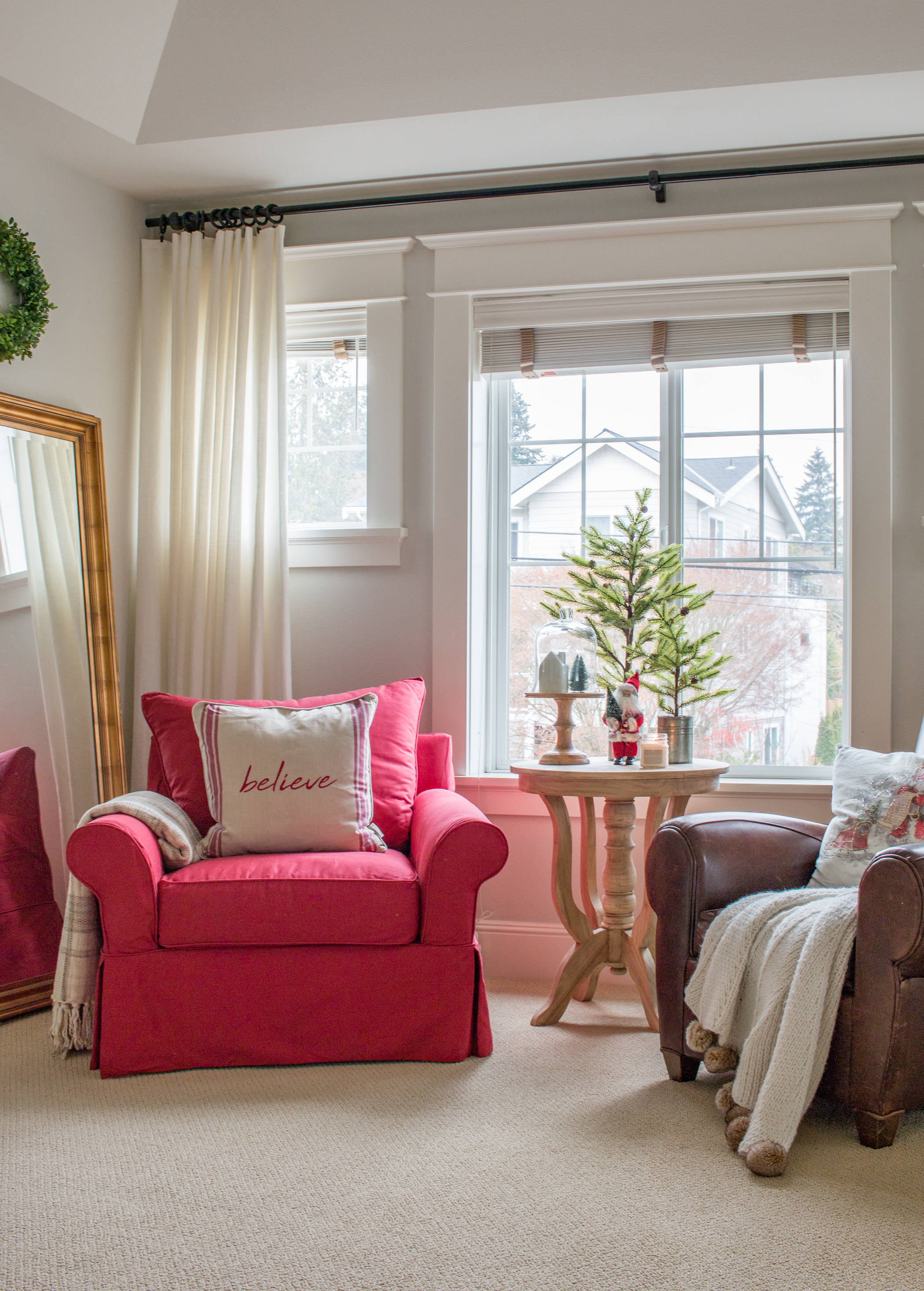 Bedroom Sitting Area With Red Slipcovered Chair At Christmas